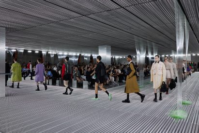 Models on slime catwalk for Prada