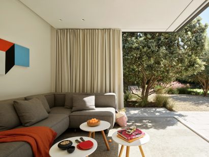 Living area with operable glass doors