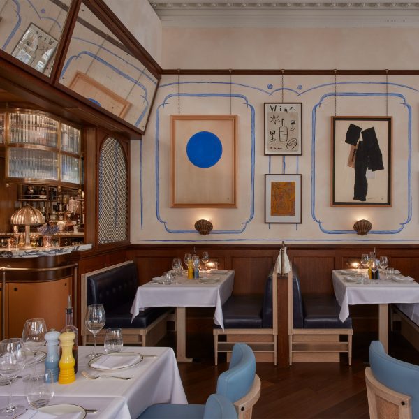 French-style Socca restaurant in London with wood panelling and hand-painted murals