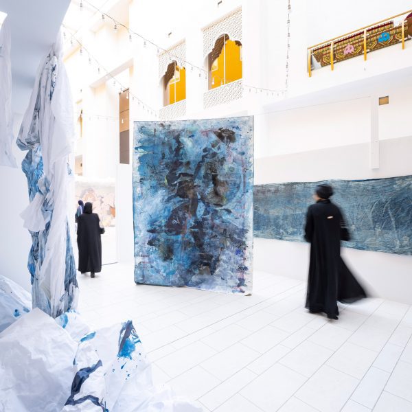 An exhibition of student design work in a white gallery by Virginia Commonwealth University