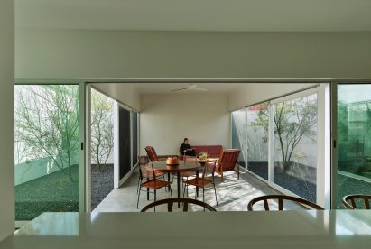 Seating area within white stucco house