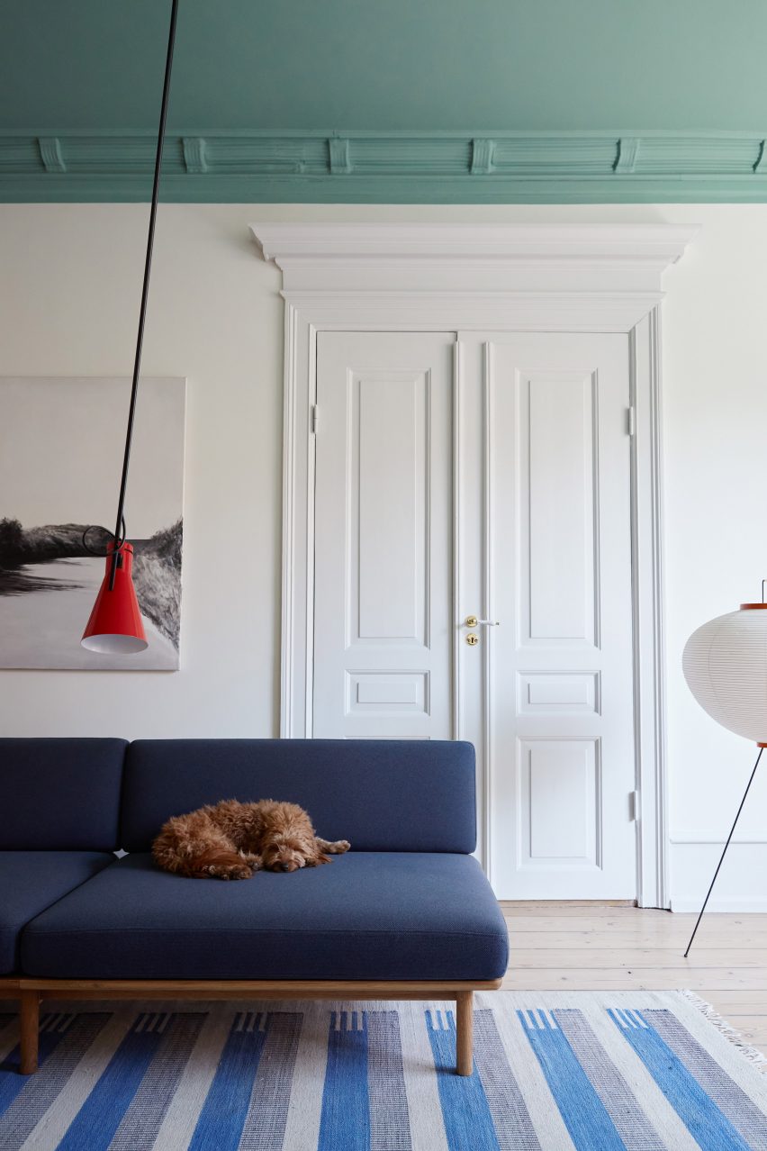 Blue sofa in Scandi-style interior