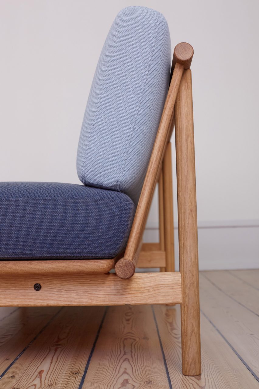 Detail of back of sofa with wooden spokes visible