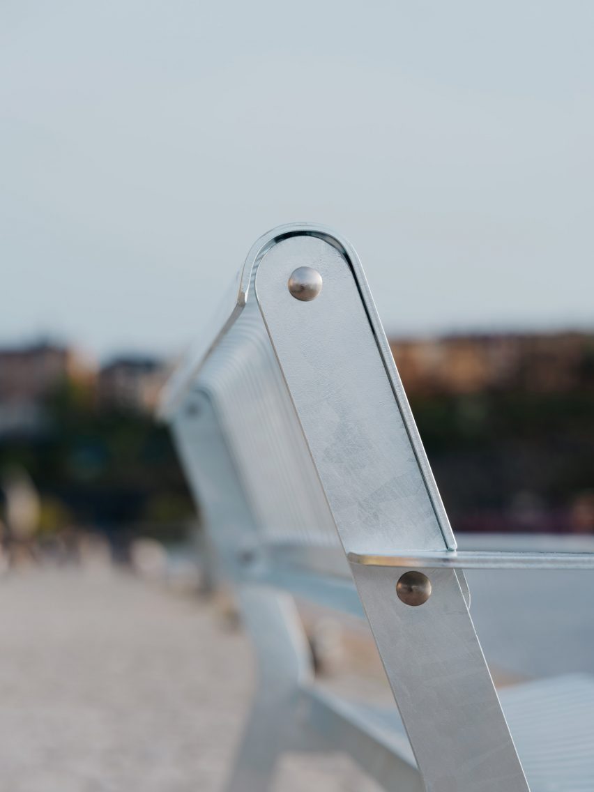 Close-up photo of the Tellus bench backrest showing screw detail