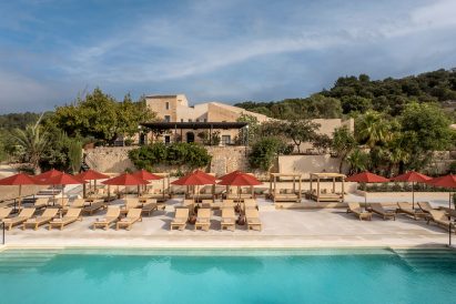 Overview of The Lodge hotel with its pool