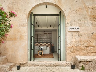 View from exterior into the lounge of a hotel in Mallorca by Único Hotels and interior designer Pilar García-Nieto