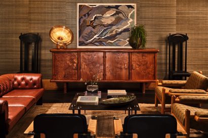 Walnut credenza with decorative objects