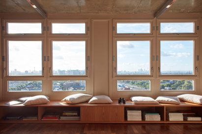 Trellick Tower flat in London features concrete and oak interior