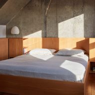 Trellick Tower flat in London features concrete and oak interior