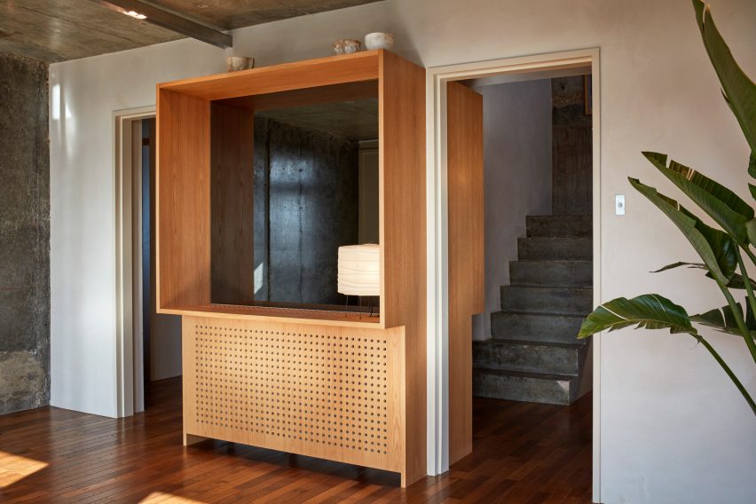 Trellick Tower flat in London features concrete and oak interior