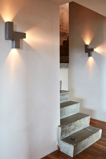 Trellick Tower flat in London features concrete and oak interior