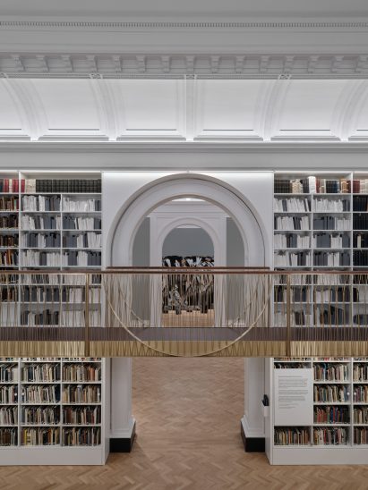 Shelves of double-height library