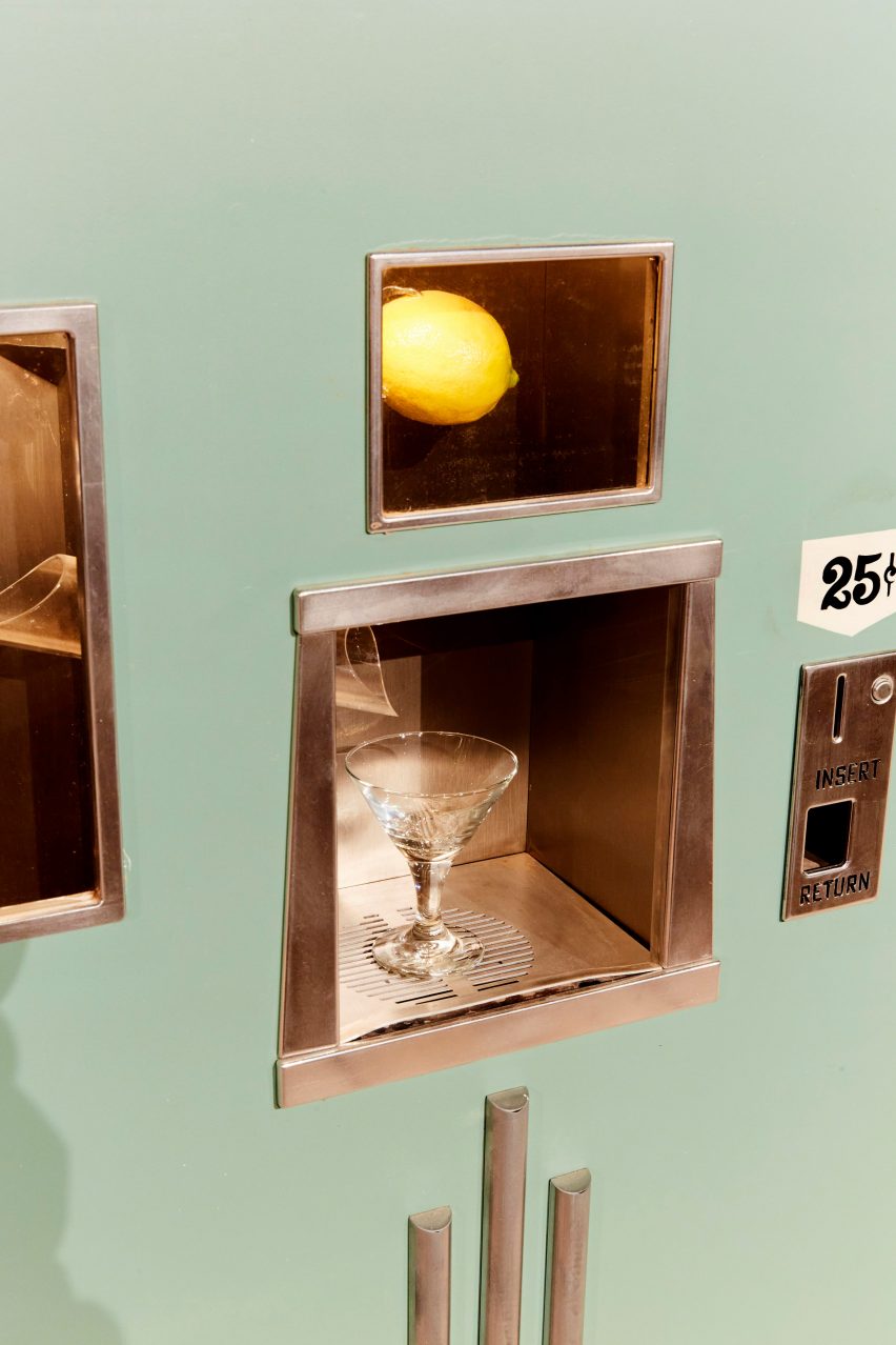 A blue vending machine dispensing martinis