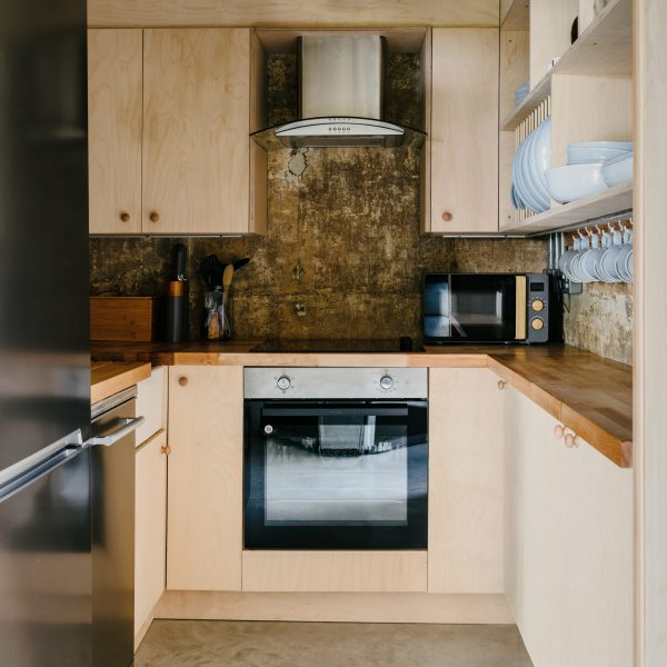 Exposed concrete walls in kitchen
