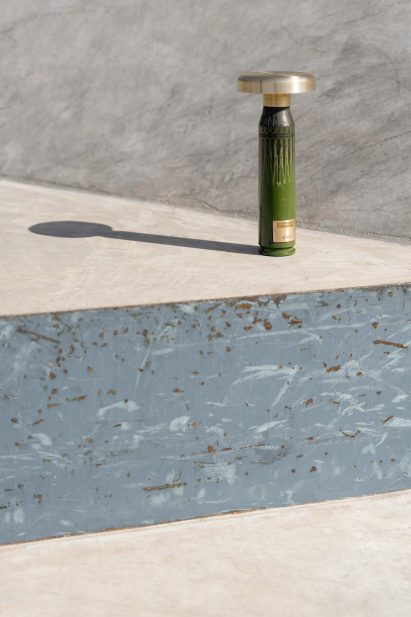 Green lamp made from shell casings