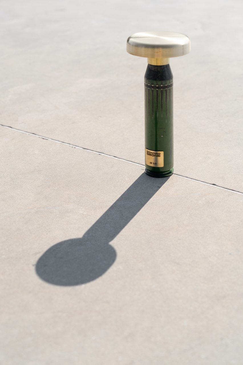 Green lamp made from shell casings
