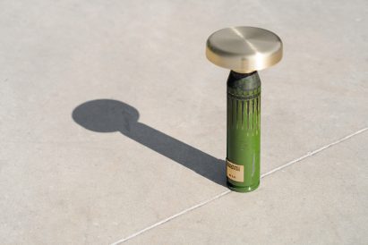 Green lamp made from shell casings
