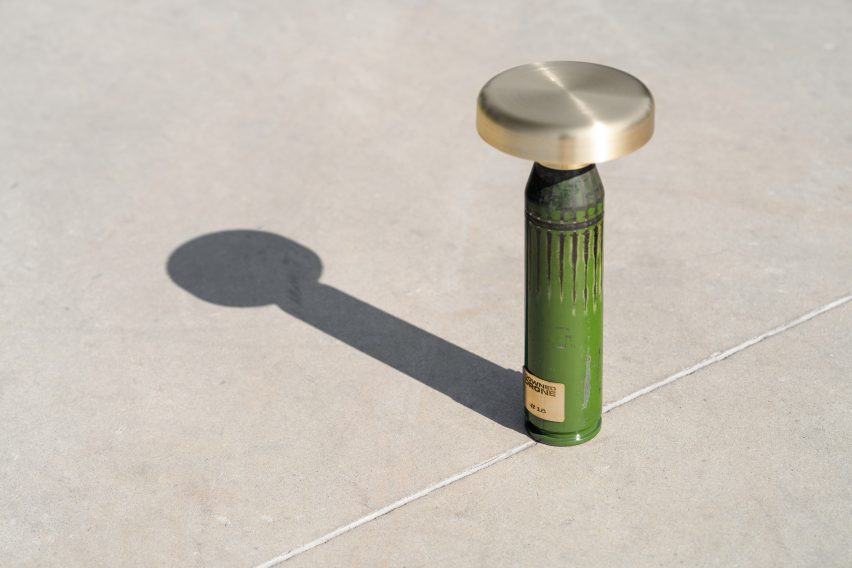 Green lamp made from shell casings