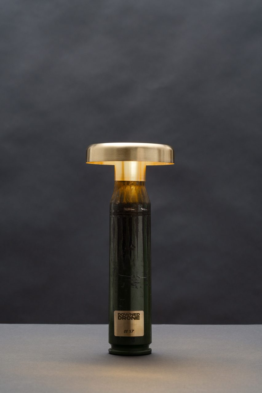 Green lamp made from shell casings