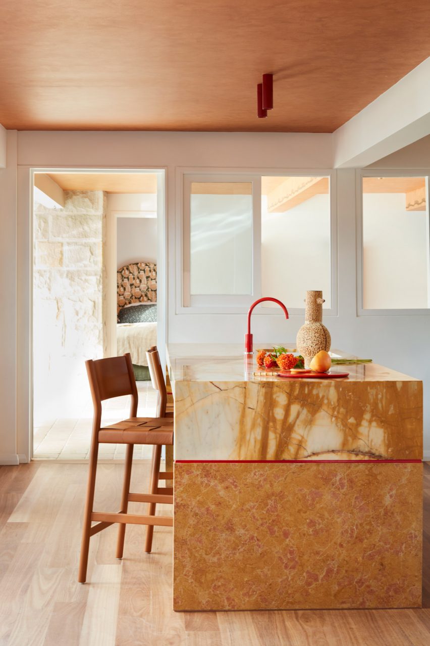Palm Beach house in Sydney by YSG with stone kitchen island