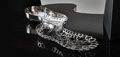Photograph showing metallic tray on coffee table