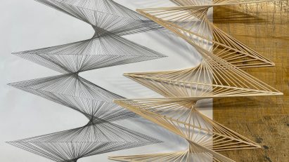 Pencil drawing with wooden sculpture next to it both showing a spicy helical structure