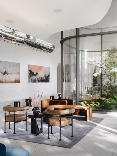 Lounge area in front of glazed atrium