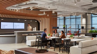 Allsteel workspace exhibition interior with timber ceiling and sofas