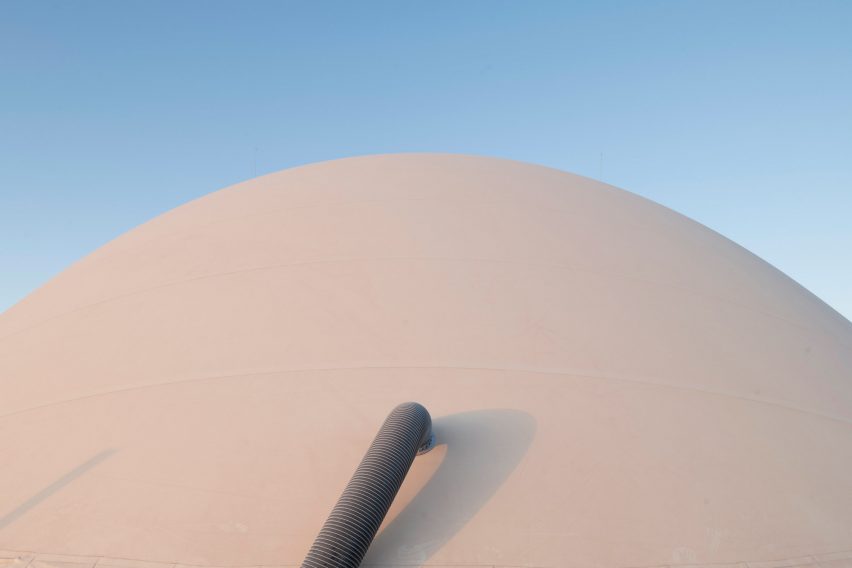 A hose attached to a dome building