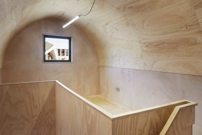 Plywood-lined interior of Angel Yard studio