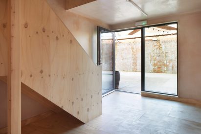 Plywood-lined interior of Angel Yard studio