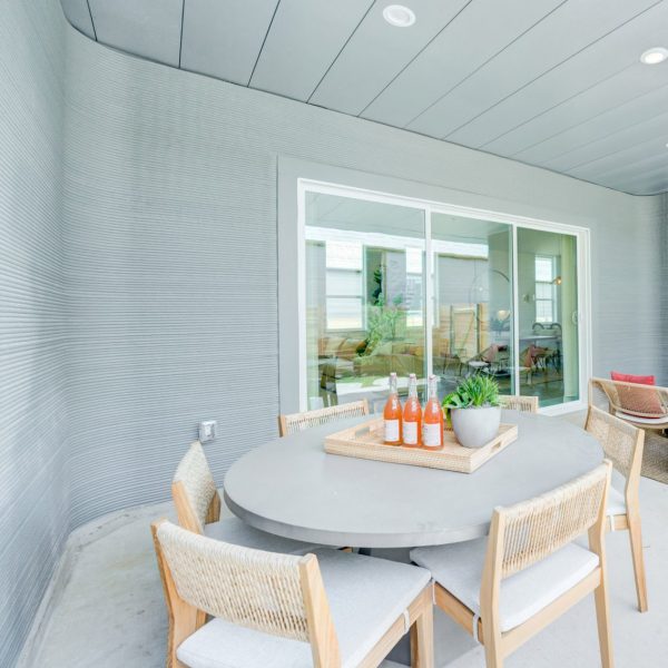 3D-printed walls and patio area of BIG house Texas