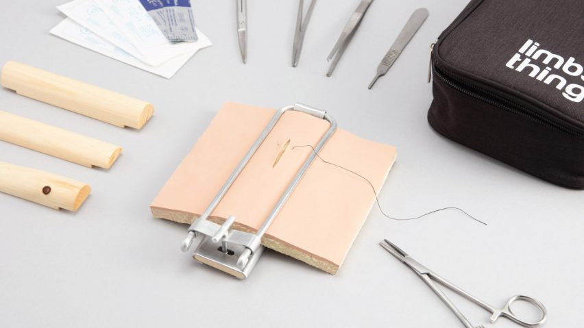 Recycled silicone suture pad surrounded by surgical tools