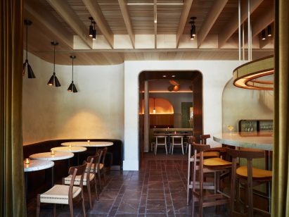 Bar area with table seating and tall stools
