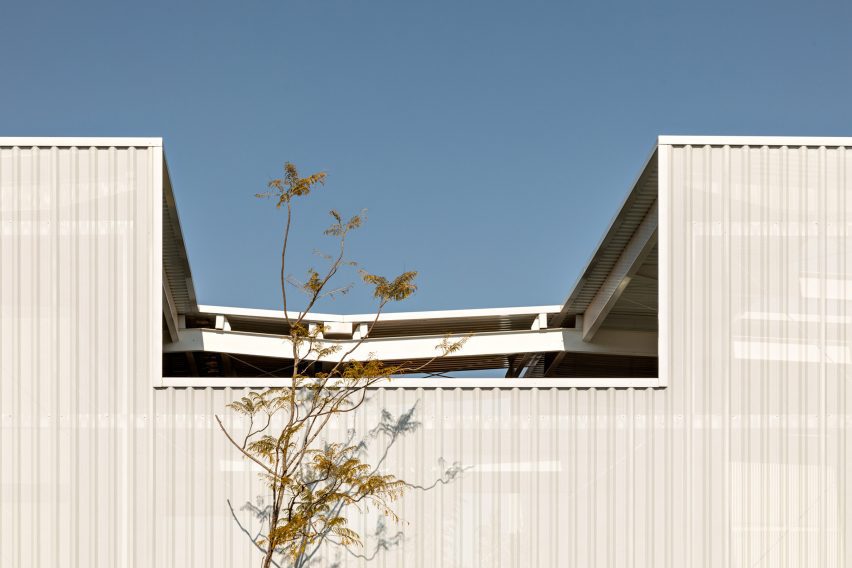 A residence with a wall of transluscent material