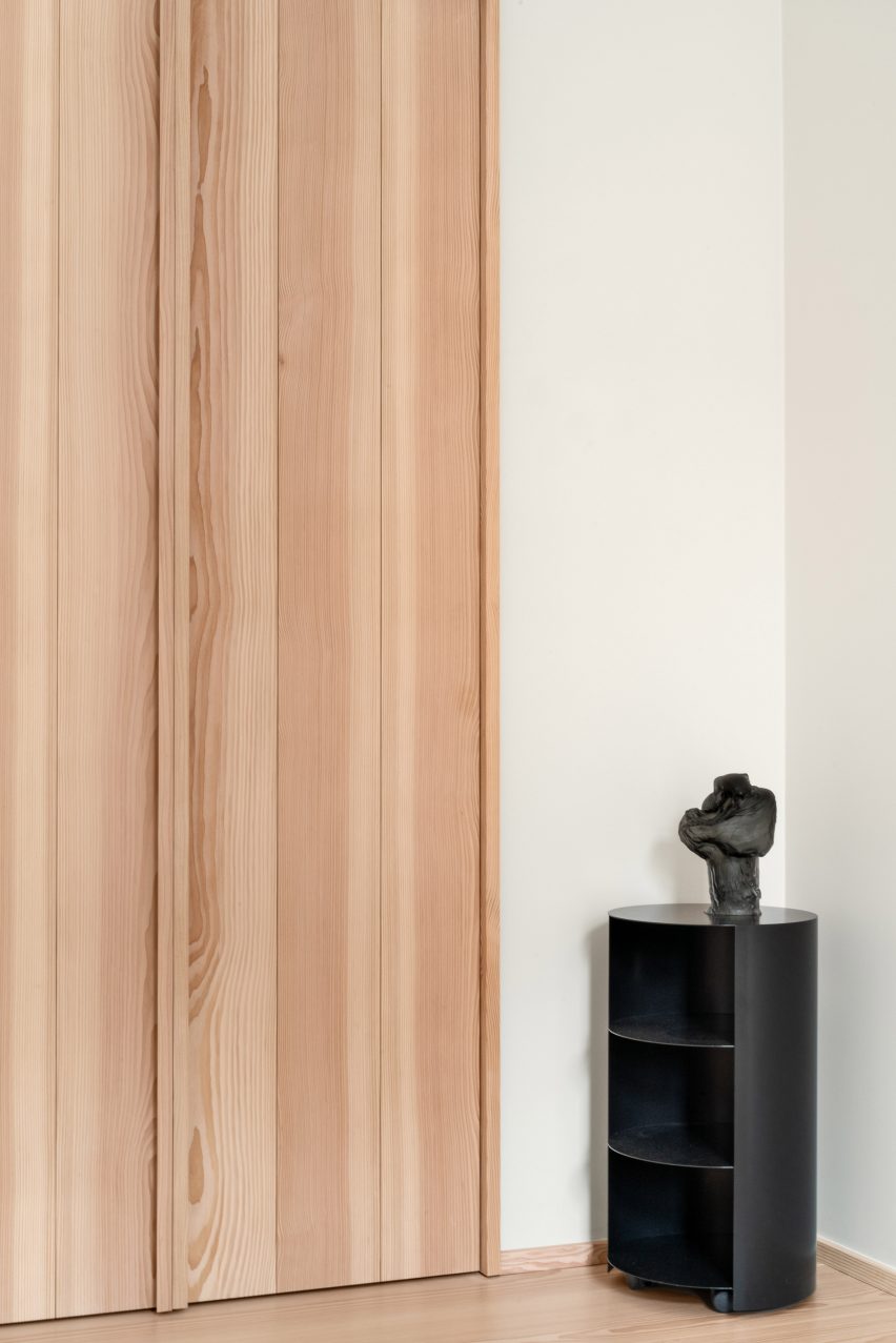 Cloudy Outlines apartment by Note Design Studio features Douglas fir joinery