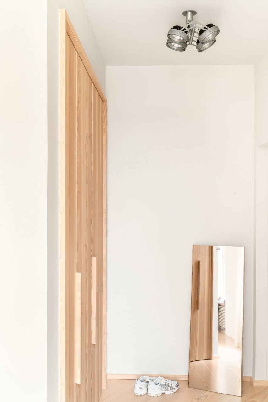 Cloudy Outlines apartment by Note Design Studio features Douglas fir joinery