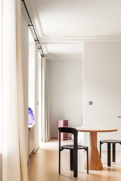Dining room interior of Cloudy Outlines apartment by Note Design Studio