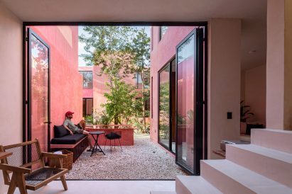 Patio at red Tulum housing by Coyote Architecture 