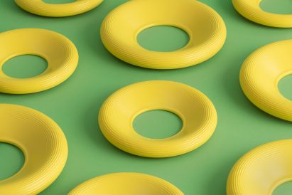 Yellow dog frisbee designed by Layer