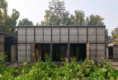 Building wrapped in bamboo screens