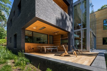 Boxy brick-clad residential volume