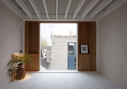 Interior of London home with exposed wood ceiling