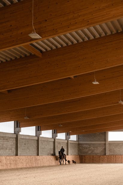 Horse riding inside Horse House by Wiercinski Studio