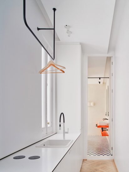Utility area in corridor of JJ16 apartment by Lucas y Hernández-Gil