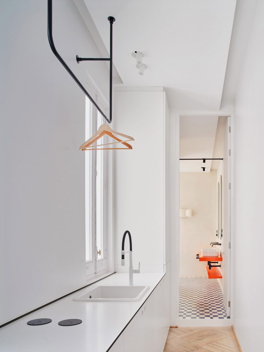 Utility area in corridor of JJ16 apartment by Lucas y Hernández-Gil