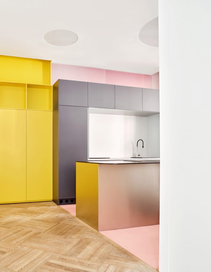 Pink, grey and chrome Kitchen in JJ16 apartment by Lucas y Hernández-Gil
