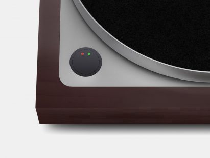 Rendering of the bottom left corner of the Linn Sondek LP12-50 showing a redesigned, circular and flat primary button with two small red and green lights
