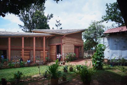Rammed earth art centre in Uganda with angular roof