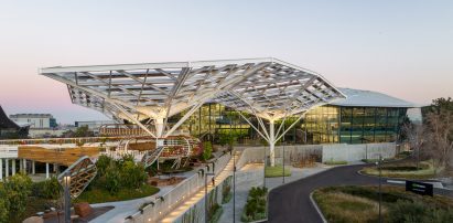 A large trellis with photovoltaic panels by Hood Design Studio for a project in Silicon Valley